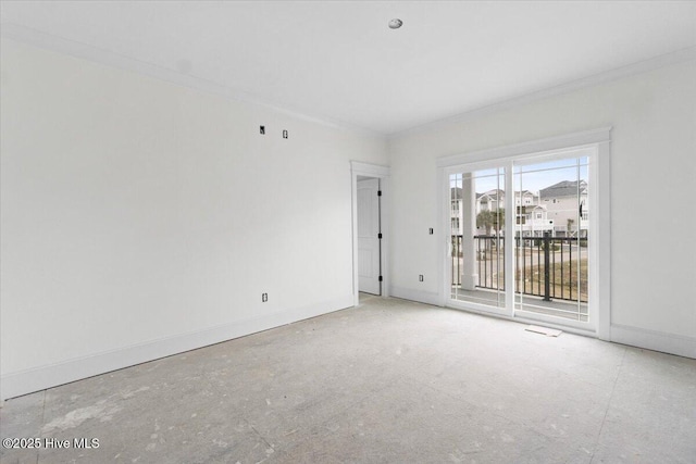 spare room featuring ornamental molding