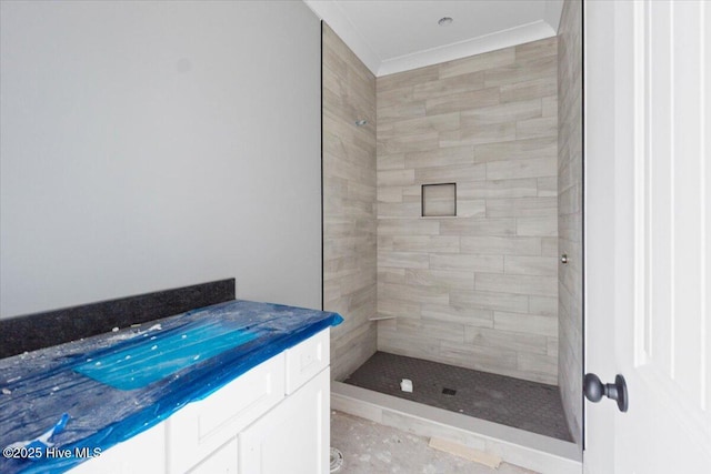 bathroom featuring tiled shower