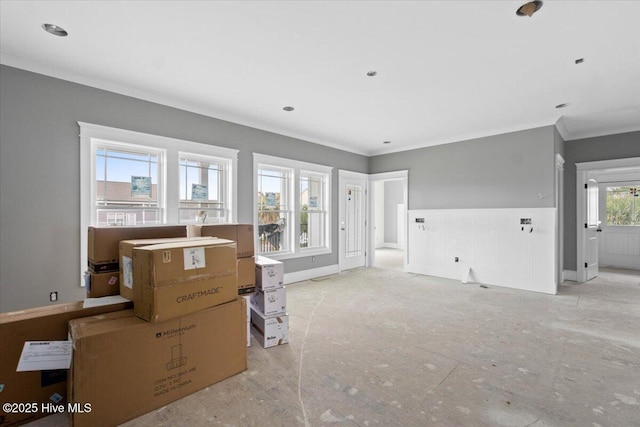 living room with ornamental molding