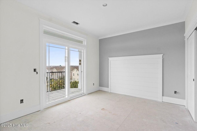 unfurnished room featuring ornamental molding