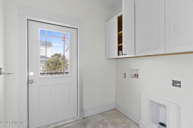 washroom with cabinets and washer hookup