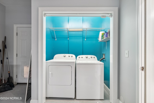 laundry area featuring washing machine and dryer