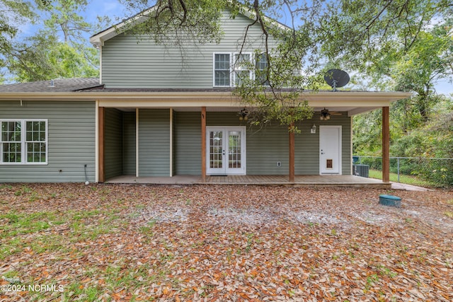 back of property with ceiling fan, central AC unit, a patio area, and french doors