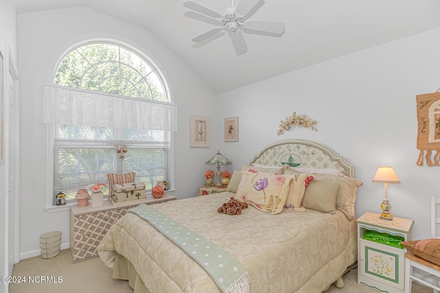 bedroom featuring ceiling fan and lofted ceiling