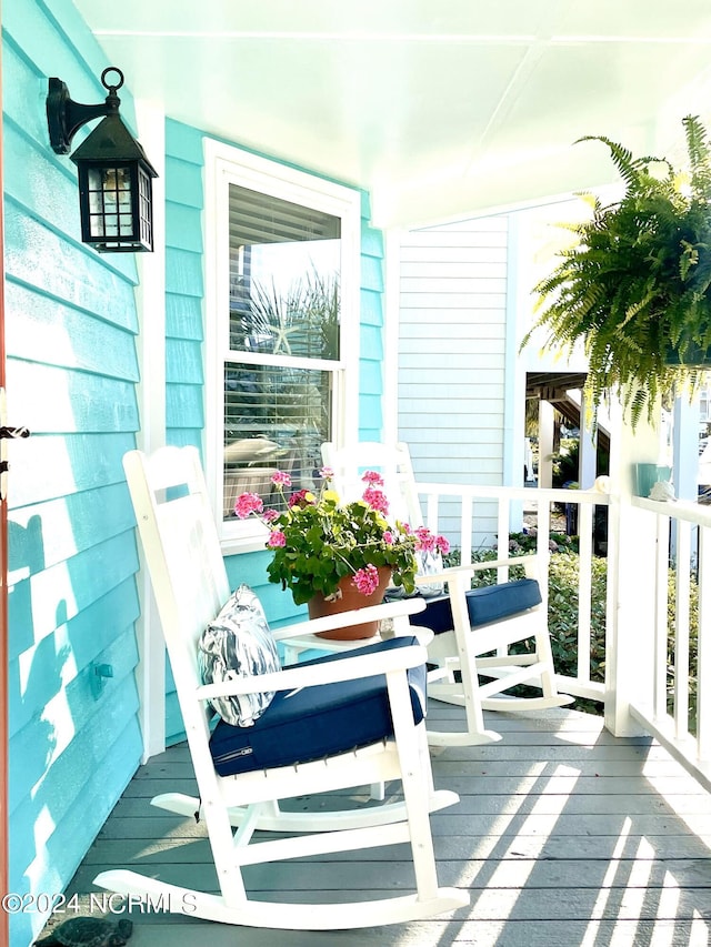 142 Carolina Ave, Holden Beach, NC 28462 - view of sunroom / solarium