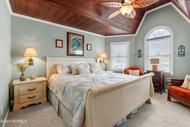 bedroom featuring light carpet, multiple windows, and wooden ceiling