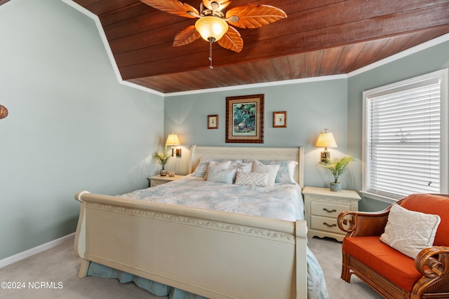 carpeted bedroom with wooden ceiling, crown molding, and baseboards