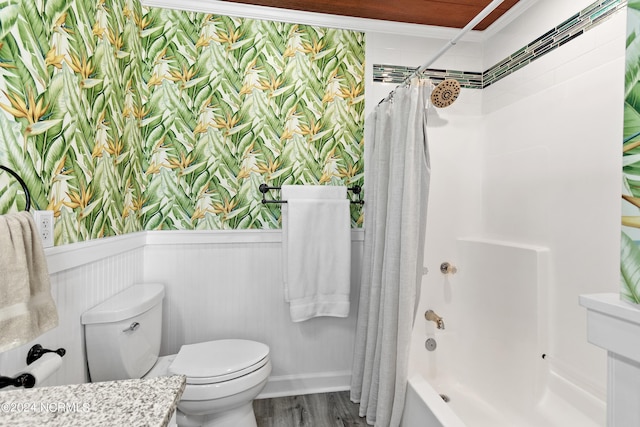142 Carolina Ave, Holden Beach, NC 28462 - bathroom featuring wainscoting, toilet, wood finished floors, shower / tub combo, and crown molding