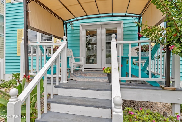 142 Carolina Ave, Holden Beach, NC 28462 - property entrance featuring french doors