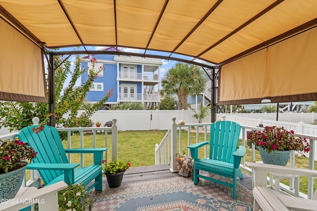 view of patio / terrace with a fenced backyard and a wooden deck