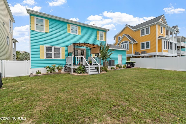 142 Carolina Ave, Holden Beach, NC 28462 - rear view of house with central AC unit