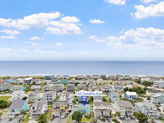 142 Carolina Ave, Holden Beach, NC 28462 - aerial perspective of suburban area featuring a large body of water
