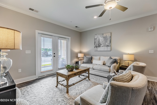 living room featuring crown molding, ceiling fan, hardwood / wood-style floors, and french doors