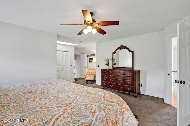 carpeted bedroom with ceiling fan and a closet