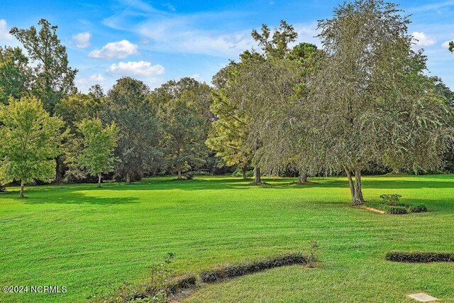 birds eye view of property featuring a rural view