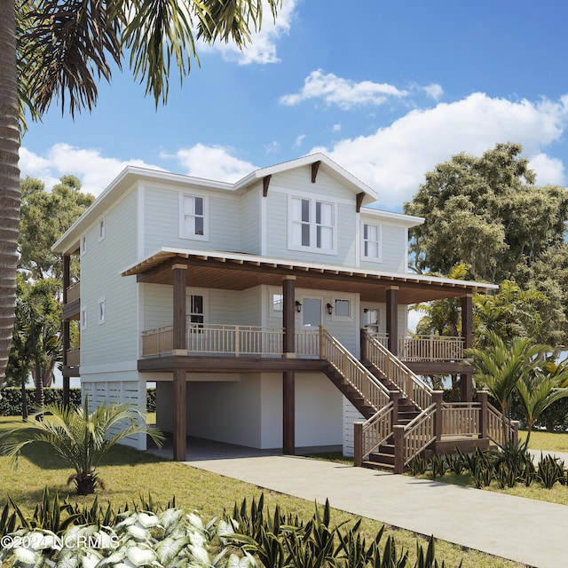 coastal inspired home with a garage, driveway, a porch, and stairway