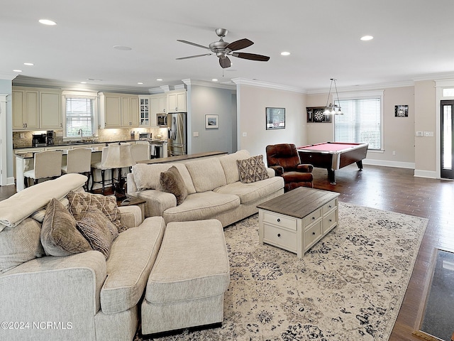 living room with pool table, ornamental molding, light wood-type flooring, and ceiling fan