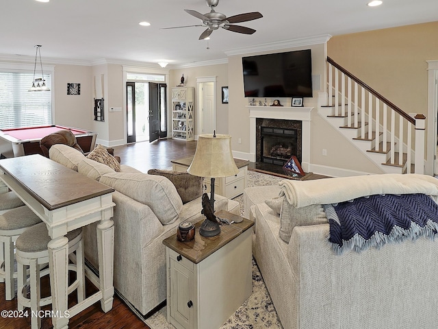 living room with wood-type flooring, pool table, ceiling fan, and crown molding