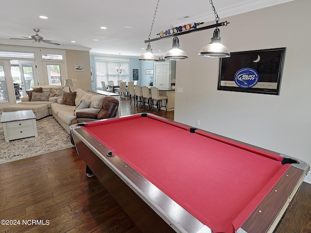 game room featuring crown molding, dark hardwood / wood-style floors, ceiling fan, and billiards