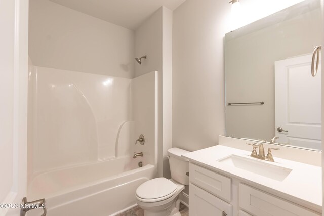 full bathroom featuring toilet, shower / bathing tub combination, and vanity