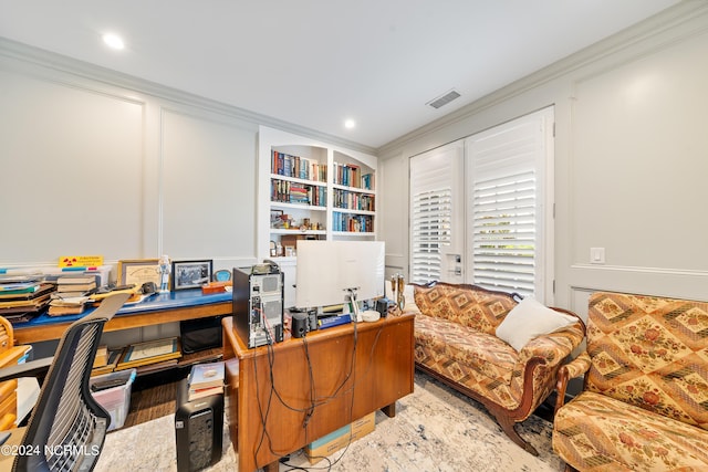 office space with recessed lighting, built in features, visible vents, and crown molding