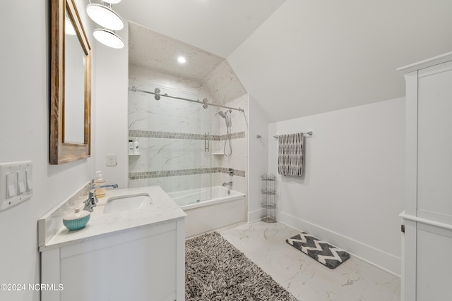 full bathroom featuring bath / shower combo with glass door, vanity, baseboards, vaulted ceiling, and marble finish floor