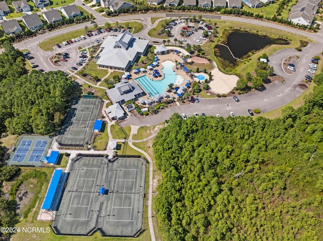 birds eye view of property with a residential view