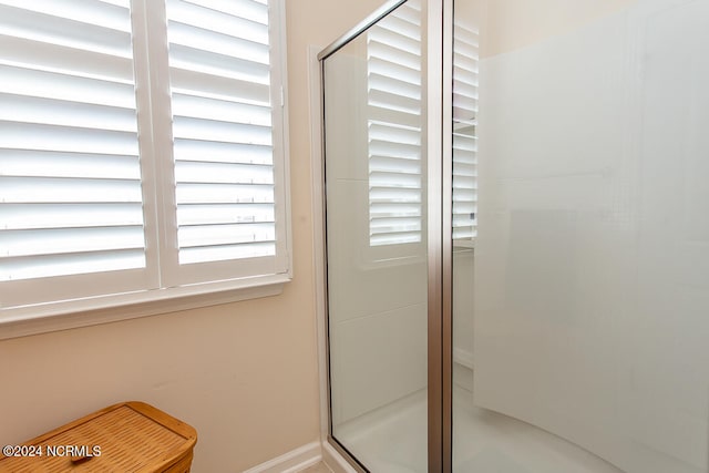 bathroom featuring walk in shower