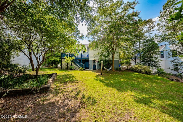 view of yard featuring a deck