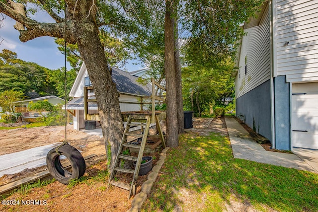 view of yard featuring a garage