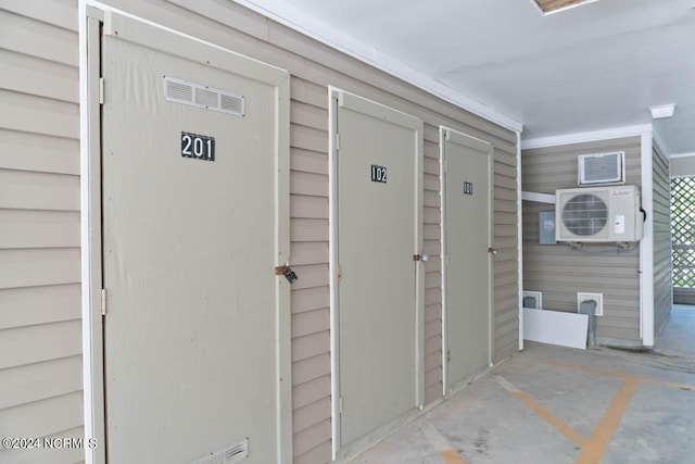 view of exterior entry featuring ac unit