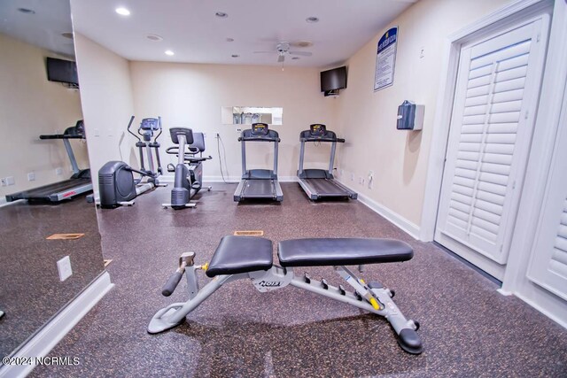 workout area featuring ceiling fan