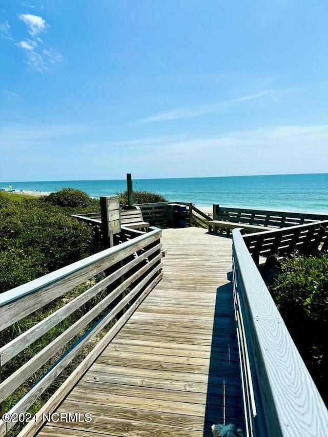 view of dock with a water view