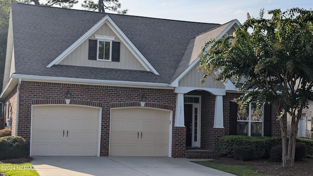 view of front of property featuring a garage