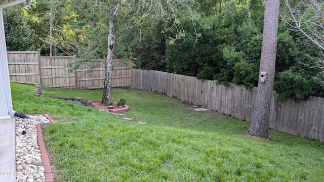 view of yard featuring a fenced backyard