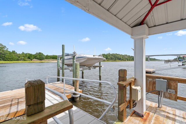 dock area featuring a water view