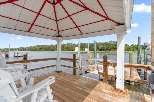 view of dock with a water view