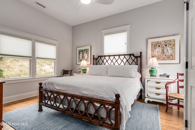12 Killegray Rdg, Bald Head Island, NC 28461 - bedroom featuring wood finished floors, baseboards, and a ceiling fan