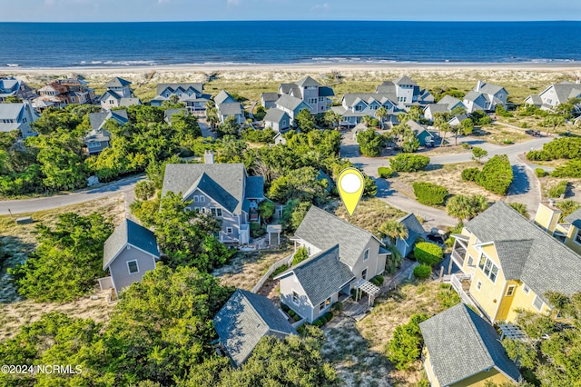 bird's eye view with a view of the beach, a residential view, and a water view