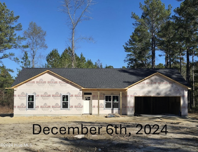 property under construction with a garage