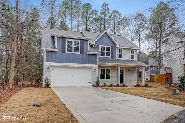 view of front facade featuring a garage and a front lawn