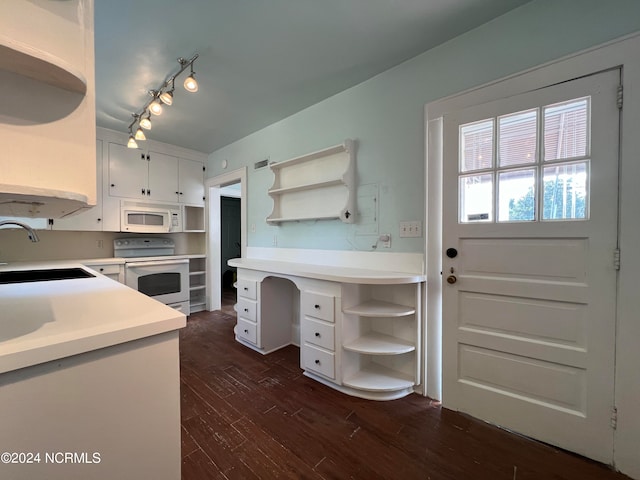 kitchen featuring dark hardwood / wood-style floors, sink, white appliances, and white cabinetry