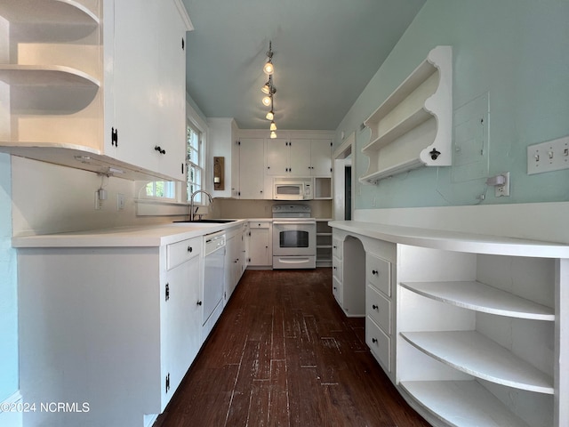 kitchen with dark hardwood / wood-style flooring, sink, white appliances, and white cabinetry