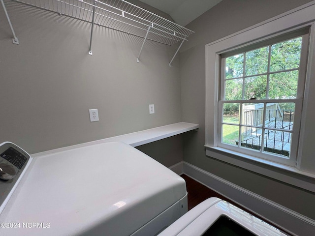 clothes washing area with a wealth of natural light