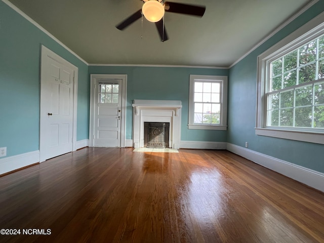 unfurnished living room with crown molding, ceiling fan, and wood-type flooring