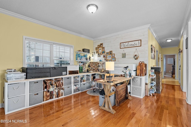 office space with ornamental molding, a textured ceiling, and wood finished floors