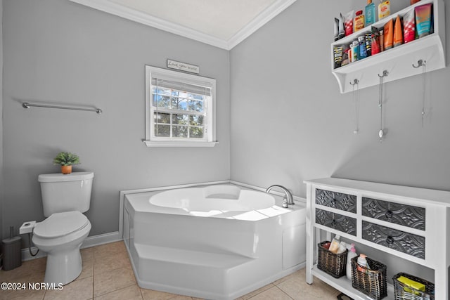 bathroom featuring crown molding, toilet, tile patterned flooring, baseboards, and a bath