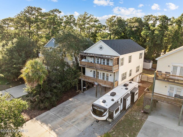 view of front facade with a carport