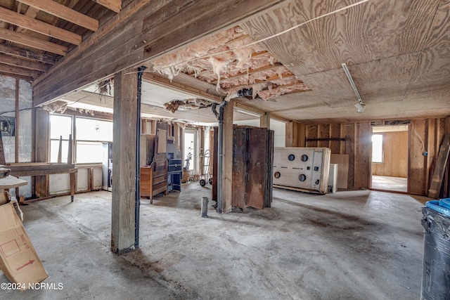 misc room featuring concrete flooring and plenty of natural light