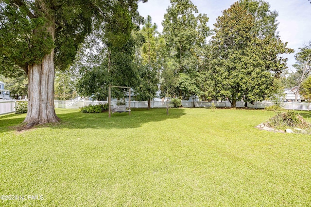 view of yard with fence